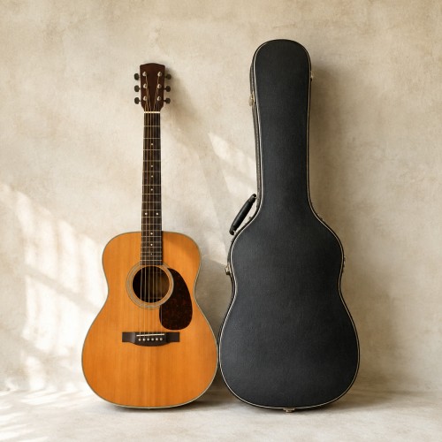 Lot 106 · Acoustic Guitar and Case